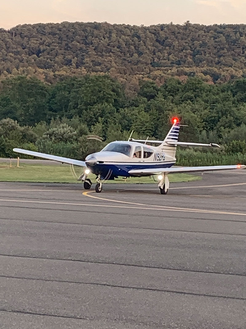 plane taxiing on runway